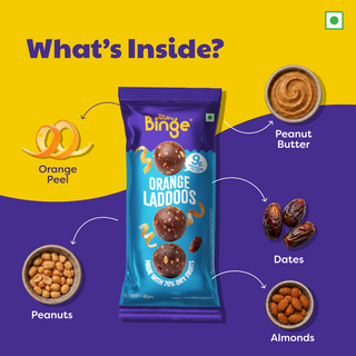 A branded snack pouch labeled 'What's Inside?' surrounded by ingredient callouts: orange peel, peanut butter, dates, peanuts, and almonds. The central product is a blue bag of THB's Orange Laddoos.