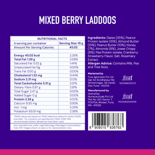 Back of a packaged food product showing a Nutrition Facts panel, ingredients list, allergen advice, and a barcode on a white background. The product name 'MIXED BERRY LADDOS' appears at the top in purple text.